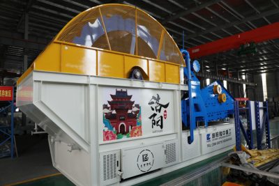 What sand washing machine should be used when the mud content is 15%?